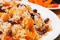 Pilaf made Ã¢â¬â¹Ã¢â¬â¹of rice, carrots, dried fruits